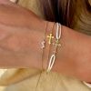 bracelet-cordon-croix-en-or-illusion-aupiho-joaillerie
